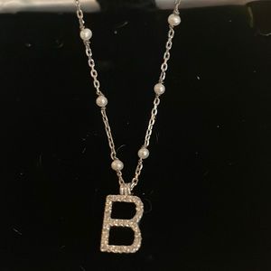 COPY -  Stamped 925 Silver, & seed Pearl initial necklace. Has a 1/2 in.”B”.